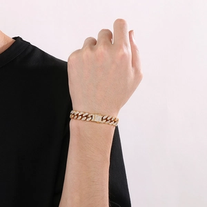 Detailed view of hip hop gold plated cuban link bracelet with sparkling rhinestones for men