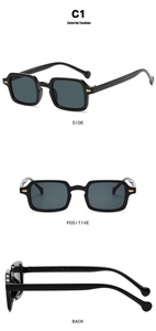 Detail view of square black sunglasses showing golden metal hinges and dimensions
