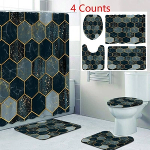 Dettaglio del set da bagno 4 pezzi con motivo marmo grigio e accenti esagonali dorati