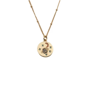 Golden star and moon celestial pendant necklace with blue and red zircon stones