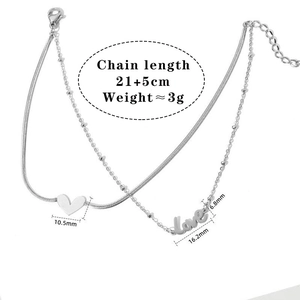 Detail of silver double-layered heart and 'love' anklet with exact size measurements