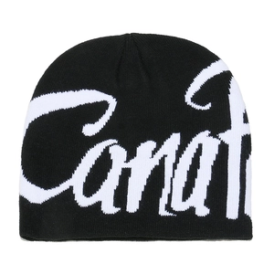 Close-up of black knitted beanie featuring white jacquard script lettering and fine texture