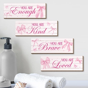 Set of 4 farmhouse wooden wall plaques with pink bows and inspirational quotes