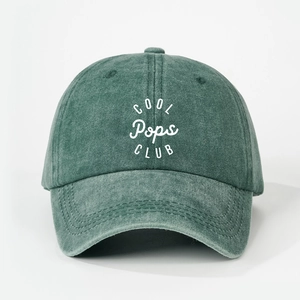 Vintage washed green cotton baseball cap featuring white COOL Pops CLUB printed typography