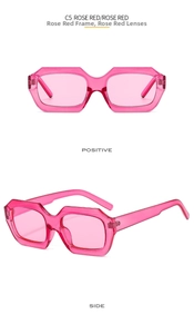 Macro detail of rose red geometric sunglasses showing both front and side view profiles