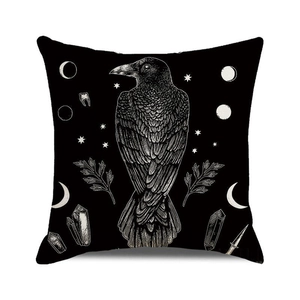 Detailed view of raven and mystical moon patterns on linen Halloween cushion cover