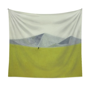 Close-up of bohemian landscape tapestry showing soft fabric texture and scenic mountain print