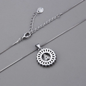 Detail of silver letter A pendant with cubic zirconia and lobster clasp on a box chain
