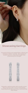 Close-up of U-shaped silver hoop earrings with micro-pave moissanite stones