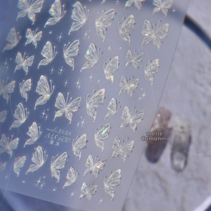 Macro shot of 3D embossed butterfly nail art stickers with aurora laser finish, model MS 600
