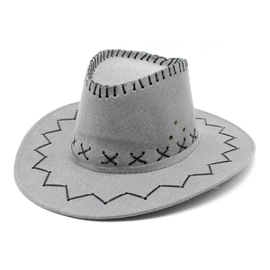 Detail of gray cowboy hat with black cross-stitch edges and metallic ventilation eyelets