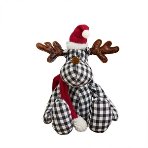 Christmas deer plush toy in black and white plaid with red knit hat and scarf decor