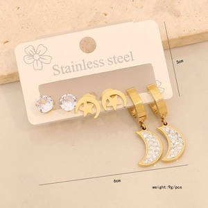 Three-piece stainless steel earring set featuring gold moons and stars with zircons
