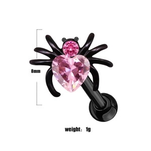 Detail of spider piercing jewelry with pink heart zircon and 8mm size measurement line