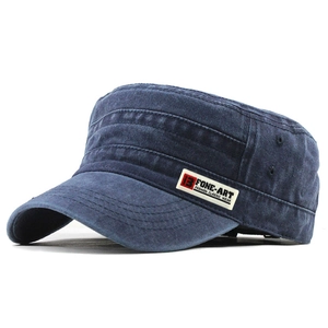 Detail of washed navy flat top military cap with embroidered side label and air vents