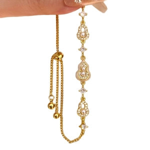 Bracelet gourde plaqué or 18 carats avec perles blanches et cristaux de zircon brillants