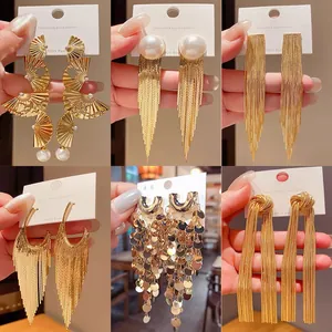 Collection of golden tassel drop earrings with pearls on S925 silver post display cards
