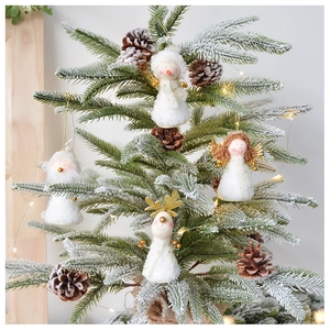 Detail of plush Christmas tree hanging ornaments with snowman angel elk and santa