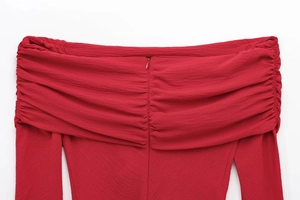 Detail of red off-shoulder chiffon top featuring ruched neck and back invisible zipper