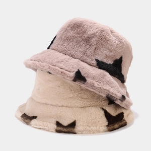 Plush faux fur bucket hats for women in pinkish-brown and cream with star pattern