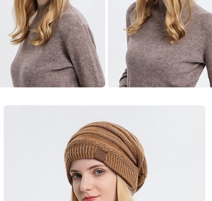 Close-up of caramel knit beanie with leather logo patch and matching turtleneck sweater