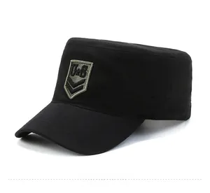Detail of military flat top cap in black featuring U.S. embroidery and reinforced brim