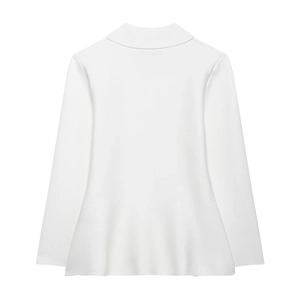 Back view of a white long sleeve turtleneck knit top with a flared peplum hem design