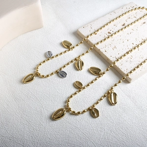 Minimalist stainless steel shell pendant necklaces in gold and silver finish with bead chains
