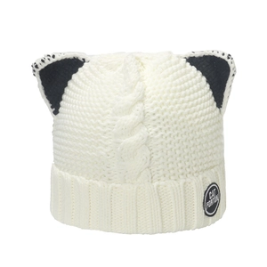 Cream knit beanie with black cat ears and woven texture for winter warmth