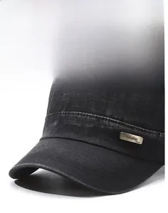 Detail of black washed denim fabric and metal plaque on this flat top military style cap