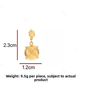 Detailed size view of golden sphere drop earring with textured cross chain patterns