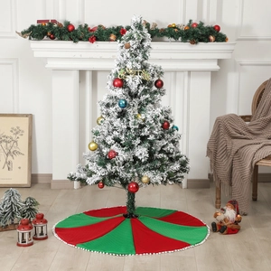 Classic red and green striped Christmas tree skirt with white pom-pom trim for home decor