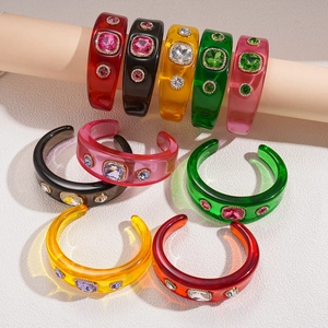 Retro geometric resin bangles set with colorful rhinestones and vintage crystal accents