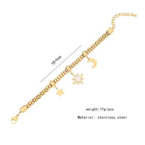 Detail of gold stainless steel celestial bracelet with moon and star charms and sizing
