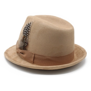 Detail of khaki felt fedora hat featuring a brown grosgrain ribbon and a spotted feather