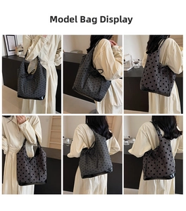 Detailed views of gray polka dot canvas tote with black leather trim and bow accent