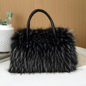 Luxurious black faux fur tote bag with leather handles shown in a minimalist home setting