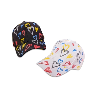Fashionable baseball caps with colorful hand-drawn heart prints in black and white colors