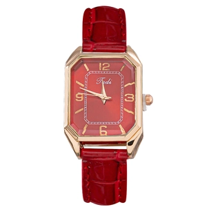 Octagonal gold quartz watch with red crocodile leather strap and numeric dial