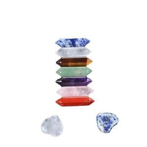 Set of 7 colorful hexagonal crystal pillars with heart-shaped natural energy stones