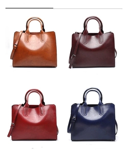 Group shot of stylish tote bags in brown, wine red, red and blue with top handles