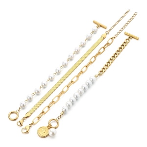 4-piece gold stainless steel bracelet set with white pearls and flat snake chain
