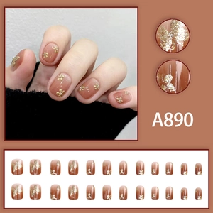 24 unghie finte sfumate marrone caramello con glitter e motivi floreali dorati