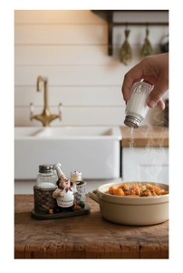 Creative chef figurine resin base with glass salt and pepper shakers in a kitchen setting