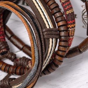 Handmade bohemian multilayer bracelets with vintage leather straps and wooden beads