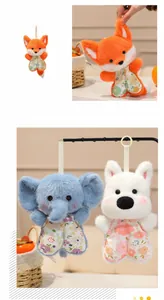 Detail showing plush animal charms with floral fabric bodies and hanging loops