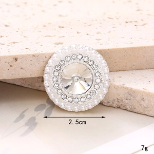 Macro shot of 2.5cm pearl and rhinestone button accessory for DIY crafts and shoes