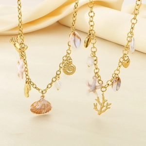 18K gold plated stainless steel necklace with starfish, seashell and seahorse charms