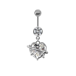 Macro shot of silver belly button ring featuring a spiked heart pendant and clear zircon