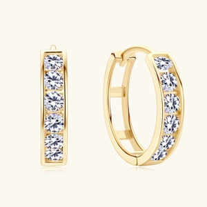 Close-up of 18K gold S925 silver hoop earrings with shimmering moissanite stones
